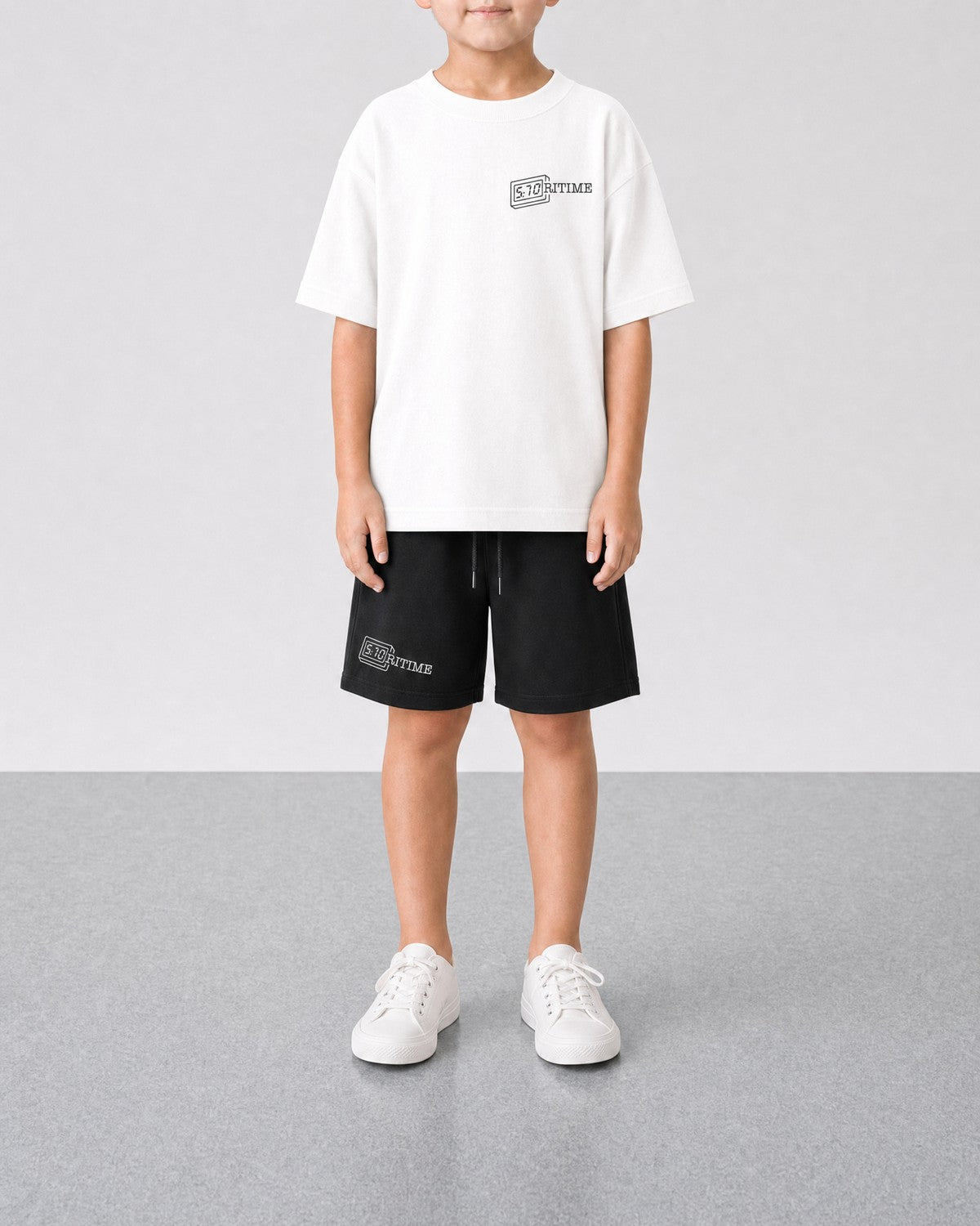 STORITIME® ST Motion Tee in Optic Black, front on-body view with ST Logo Short in Black Optic.