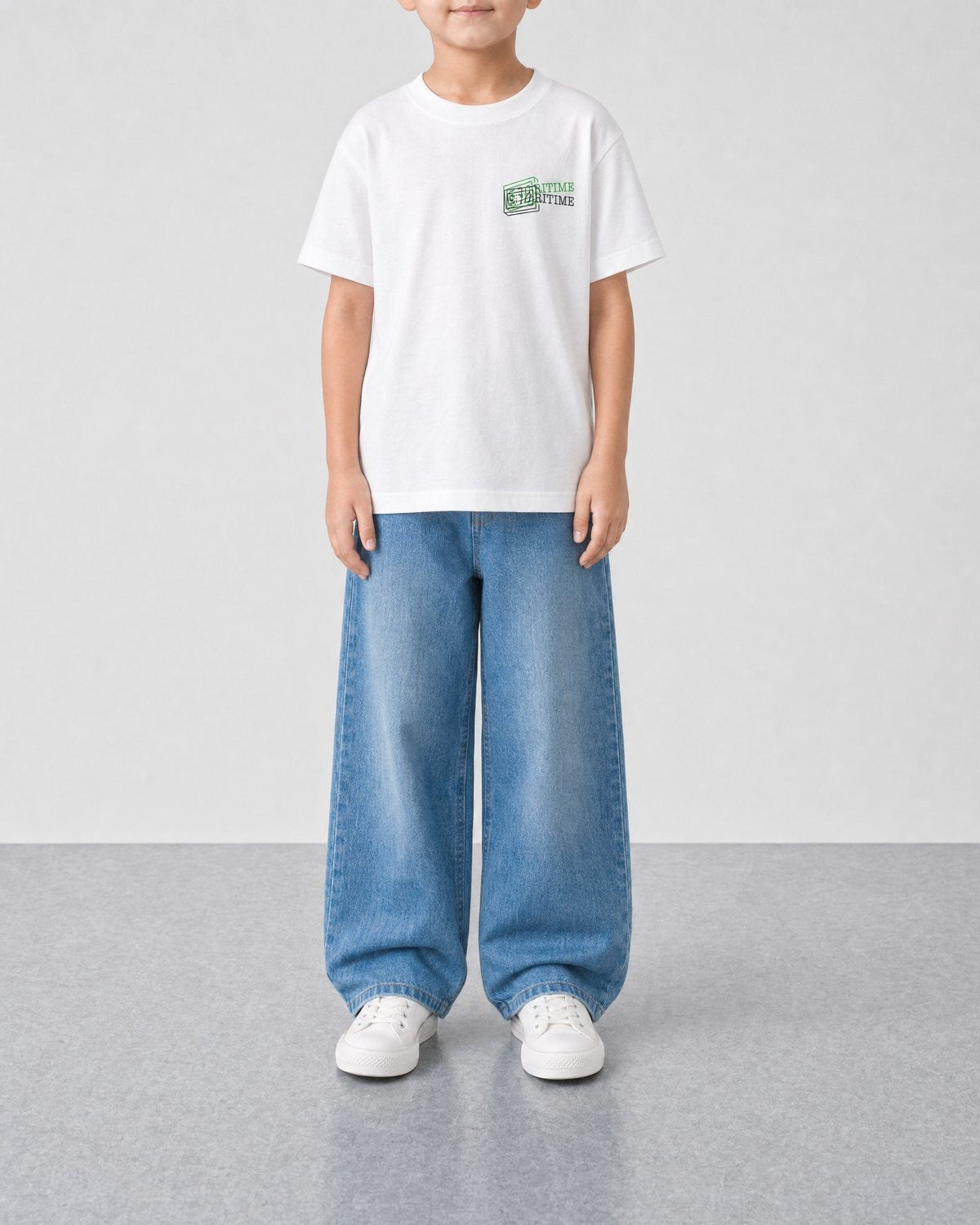STORITIME® READ More Books Tee in Optic Gecko, front on-body view with relaxed blue denim.