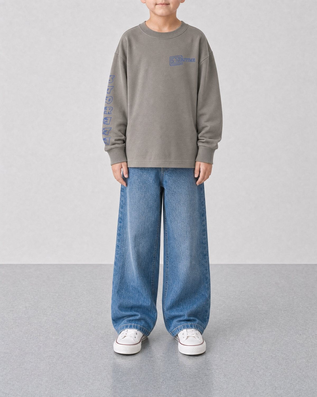STORITIME® EASY Long Sleeve Top in Cinder Blue, front on-body view with relaxed blue denim.