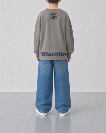 STORITIME® EASY Long Sleeve Top in Cinder Blue, back on-body view with relaxed blue denim.